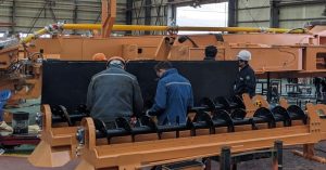 Operators fabricating the machinery